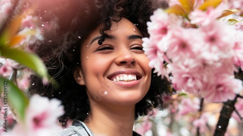 Generative AI : Beautiful happy young woman enjoying smell in a flowering spring garden