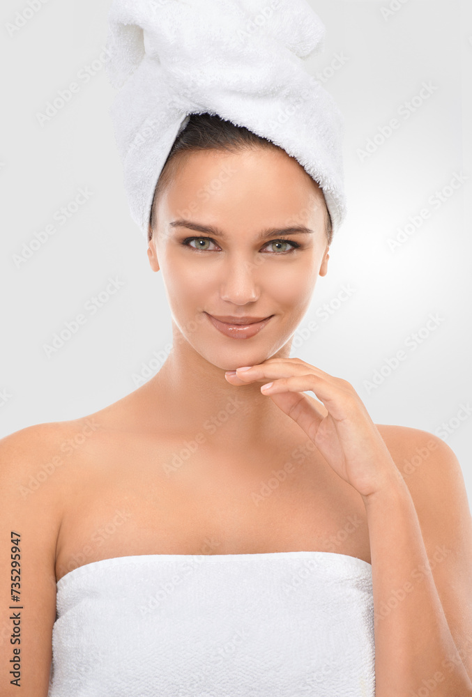 Woman, skincare and treatment in studio portrait, confidence and proud of glow on white background. Happy female person, towel and smile for healthy skin, cosmetics and dermatology for grooming Woman, skincare and treatment in studio portrait, confidence and proud of glow on white background. Happy female person, towel and smile for healthy skin, cosmetics and dermatology for grooming