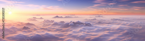 Aerial View of a Dynamic Sunset Over a Sea of Clouds and Mountain Peaks © Priessnitz Studio