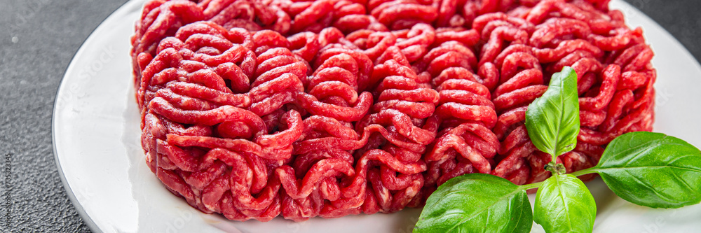 fresh minced meat beef tasty eating cooking appetizer meal food snack on the table copy space food background rustic top view fresh minced meat beef tasty eating cooking appetizer meal food snack on the table copy space food background rustic top view