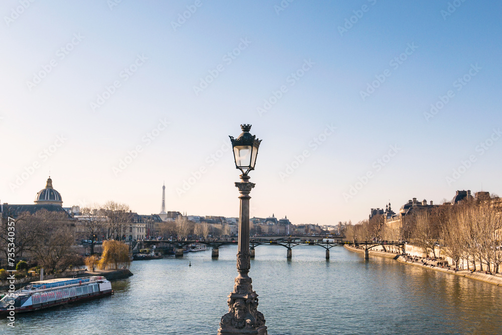Street lamp with view on Seine in Paris