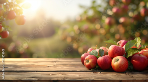 Ripe apple harvest And Empty wooden table with rural background. Selective focus on tabletop.