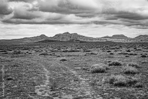High Plains prairie landscape and summer storm clouds in the northwest Wyoming wilderness, USA. Classic black and white landscape.