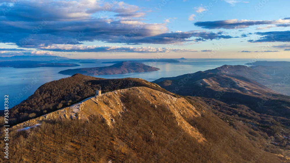 Aerial view of Mount Učka and Vojak Peak overlooking Opatija in Croatia сaptured from a drone