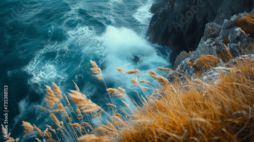The rugged beauty of a coastal cliffside, battered by waves