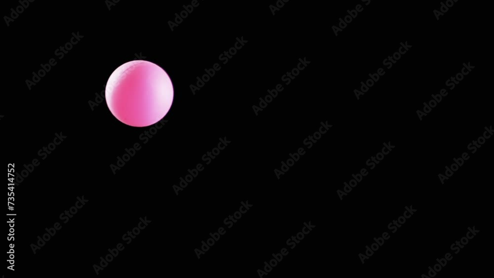 Pink Small Tennis Ball Spinning in Copy Space on Black Background. Abstract. Side view. Plastic sphere or ball balances in the air flow. levitation. Selective focus. One hovering, flying ball. Light. Pink Small Tennis Ball Spinning in Copy Space on Black Background. Abstract. Side view. Plastic sphere or ball balances in the air flow. levitation. Selective focus. One hovering, flying ball. Light.