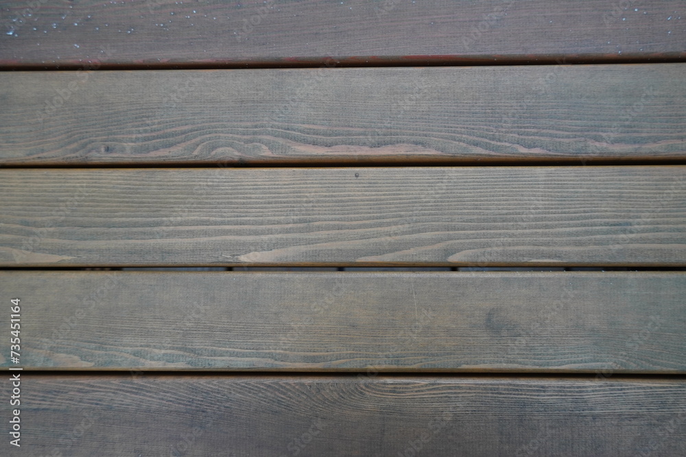 Close up of texture of wooden brown planks. Horizontal. Close up of texture of wooden brown planks. Horizontal.