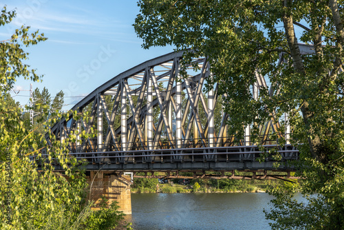 Old steel railway bridge over the river  © Jn