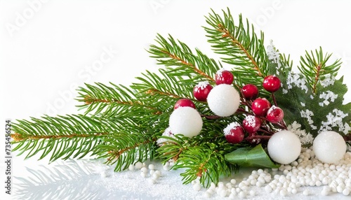 green christmas pine twigs and snowberries in a festive corner arrangement isolated on white or transparent background