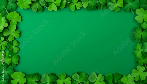 Frame made of clover leaves on green background. Three-leaved shamrocks. St Patrick Day holiday symbol. Template for design card  invitation  banner created with generative ai 