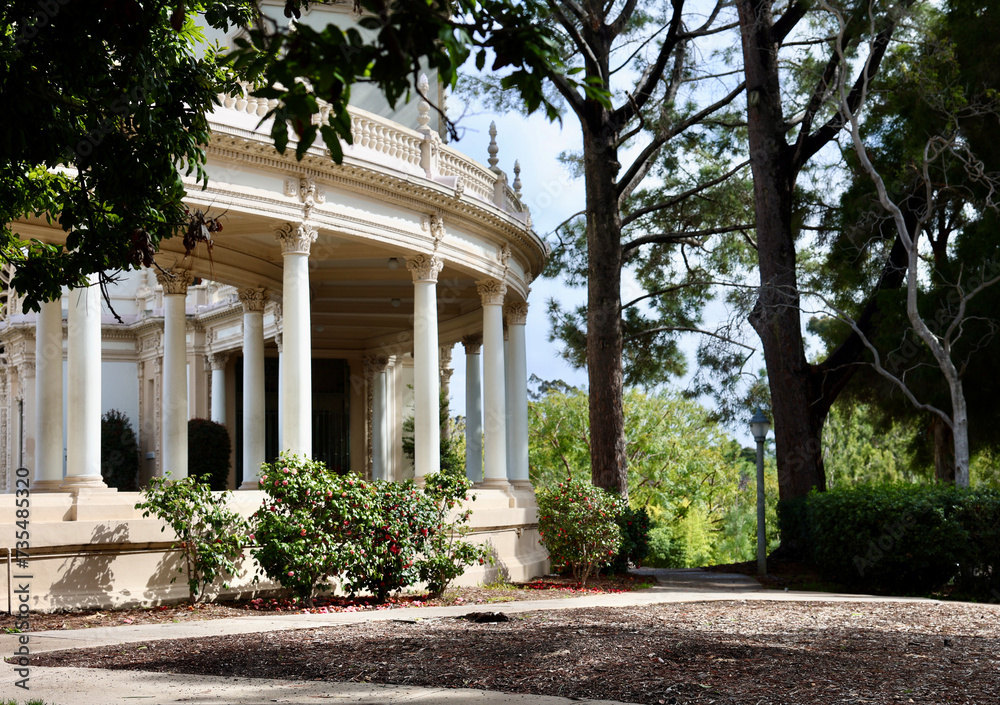 old fashioned curved colonnade surrounds the formal garden