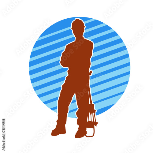 Silhouette of man in construction worker costume. Silhouette of construction worker male in pose. 