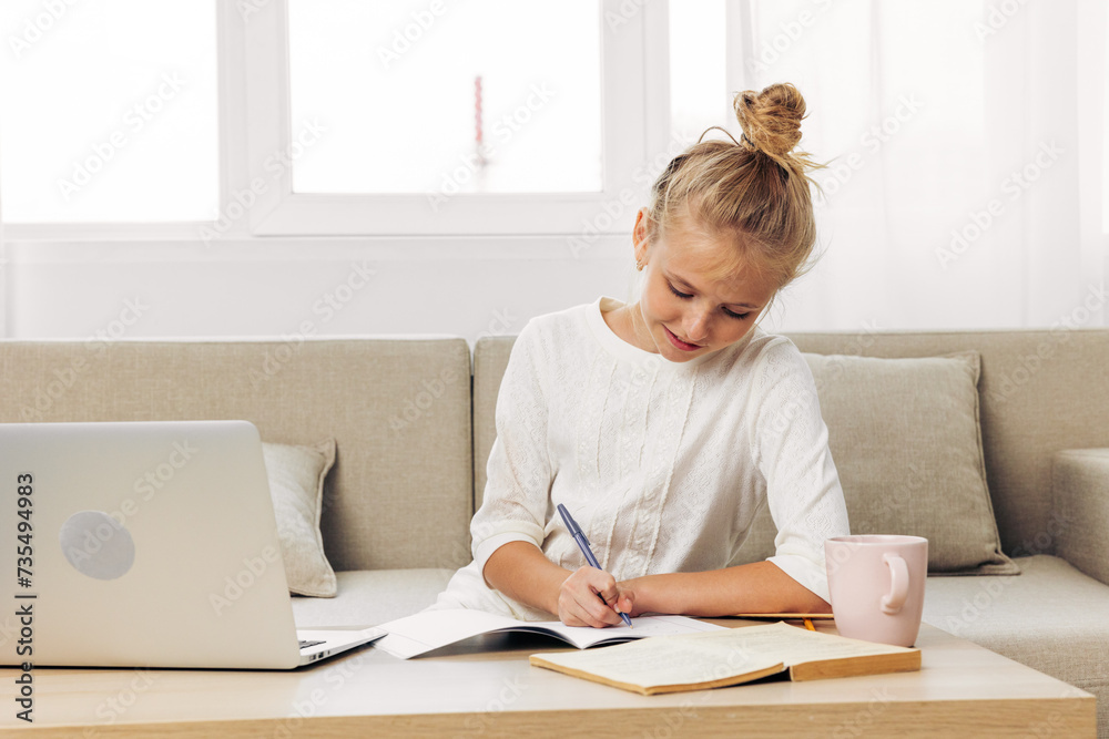 Homework learning couch distance schoolgirl laptop education online school child Homework learning couch distance schoolgirl laptop education online school child