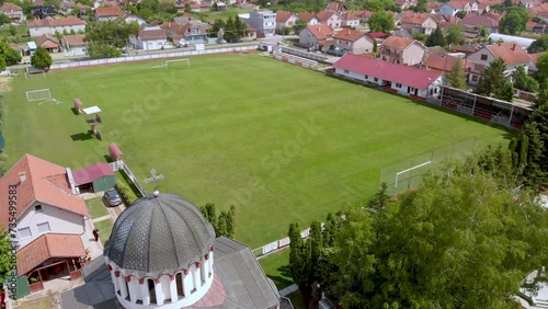 Aerial View of Ortodox Church in Town of Temerin on beautiful sunny day photo