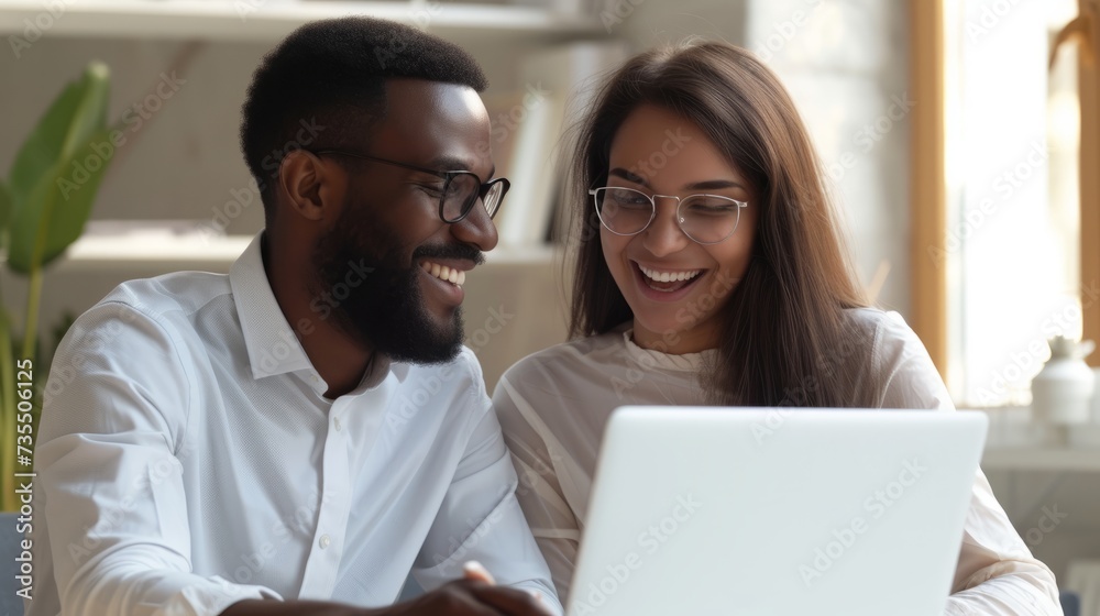 a cybersecurity expert helping out a woman client with antivirus protection on a laptop a cybersecurity expert helping out a woman client with antivirus protection on a laptop