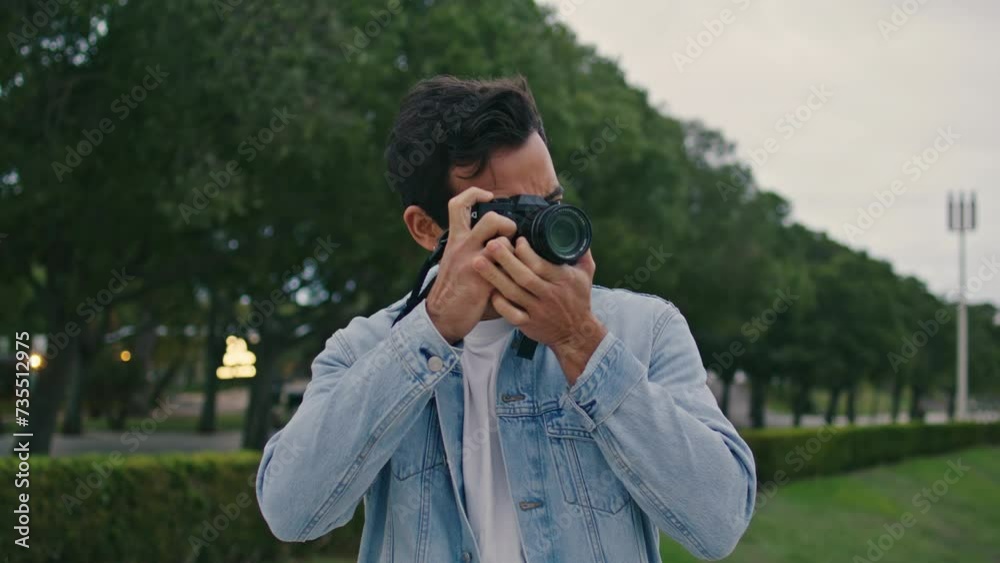 Hispanic tourist making photo town park close up. Carefree traveller shooting Hispanic tourist making photo town park close up. Carefree traveller shooting