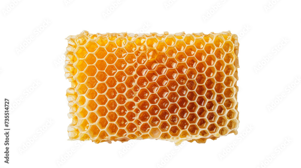 A golden honeycomb dripping with sweet amber honey, a symbol of the hardworking bees and their abundant harvest A golden honeycomb dripping with sweet amber honey, a symbol of the hardworking bees and their abundant harvest