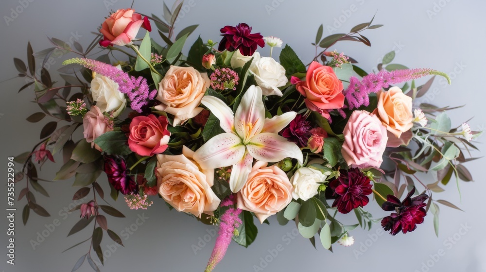 Colorful Floral Arrangement with Roses, Lilies, and Carnations