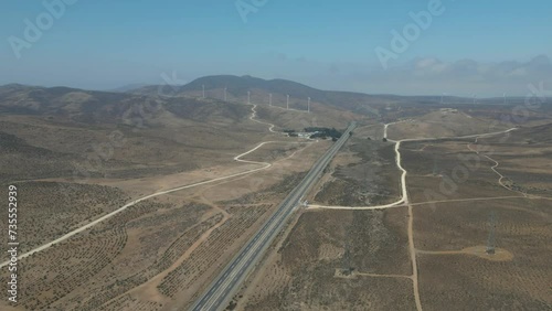 Carretera con Aerogeneradores eolicos en la Region de Coquimbo en Chile Energia Eolica photo