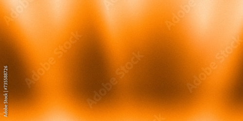 Spotlight light illuminates orange background, gradient pattern Used to design product backdrops