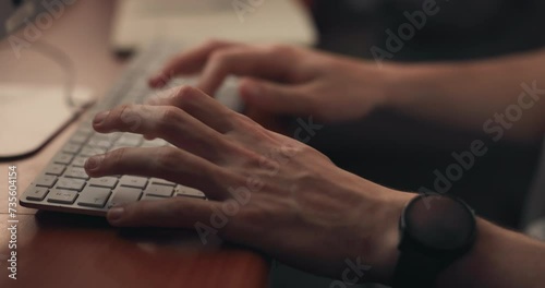 Hands, typing and computer for online research, article or editing on website for night deadline at office desk. Person, journalist or editor closeup with desktop keyboard for report and information photo