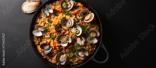 Delicious seafood and rice paella with fresh clams, a mouthwatering Mediterranean culinary delight