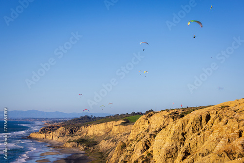 The black beach with paraglider