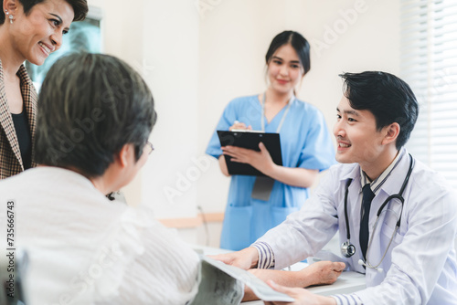 Professional male doctor in white medical uniform talk discuss results or symptoms with female patient  man GP or physician consult client give recommendation at meeting in hospital  health insurance