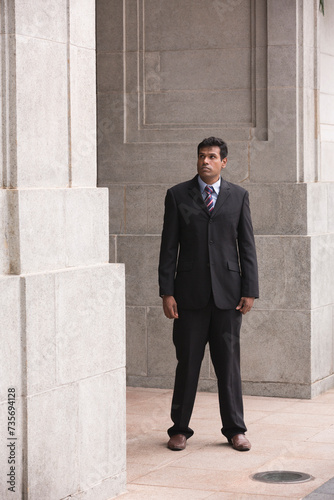 Indian business man in modern Asian city