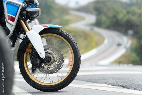 motorcycle in a sunny motorbike on the road riding.with sunset light. copyspace for your individual text. dry road	