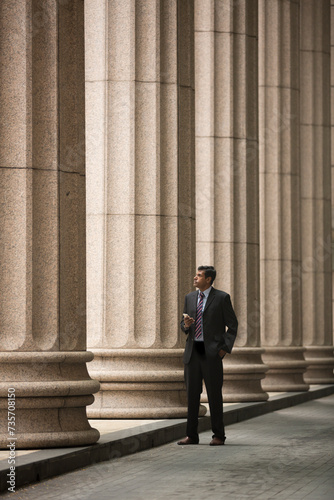 Indian Lawyer or business man outside a colonial building. © Image Smith
