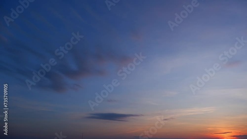 Wallpaper Mural 4K : Sunset sky time lapse : The sunset time-lapse sky transforms into a canvas of vibrant hues. Wispy clouds gracefully dance across the horizon, painting a timelapse spectacle. 
 Torontodigital.ca