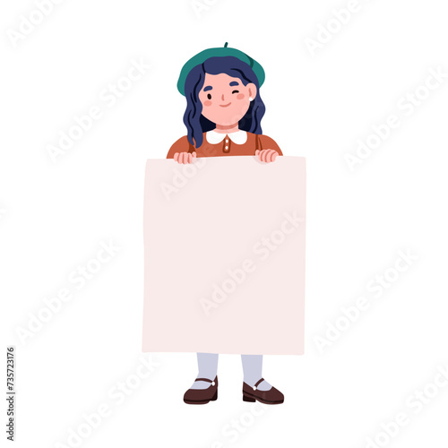 Girl child holding blank placard, advertising paper banner in hands. Happy cu...