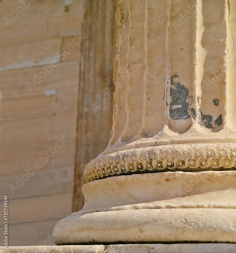 Greek history, ancient pillar or closeup of keystone arch, architectural detail for tourist attraction site. Background, outdoor or stone columns of temple building for culture in Acropolis, Greece