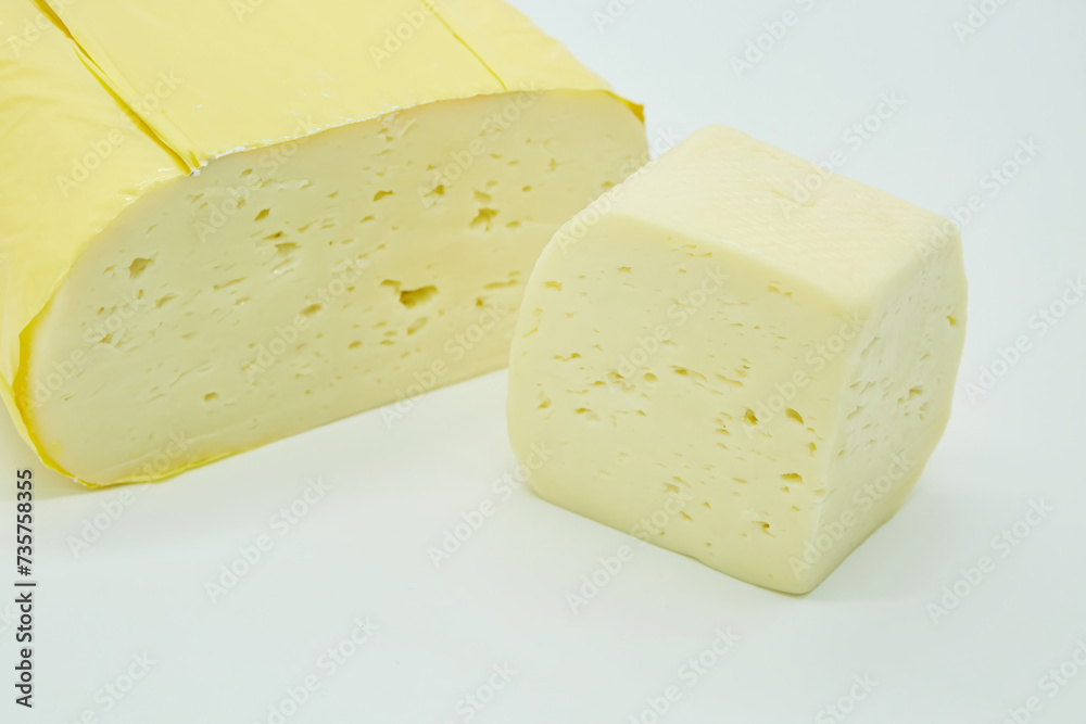 Cheese of soft varieties. The product is ready to use. White background.