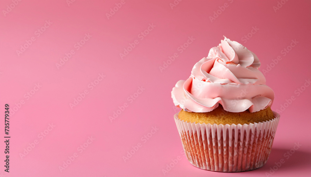 Tasty cupcake with cream on pink background, space for text Tasty cupcake with cream on pink background, space for text