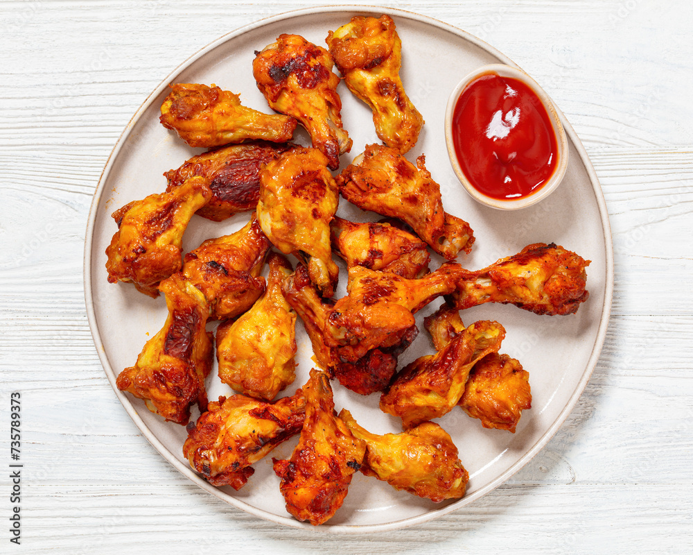 spicy crispy grilled chicken wings, top view spicy crispy grilled chicken wings, top view