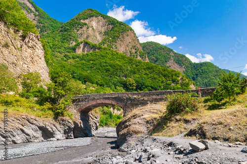 Old stone bridge named Ulu Korpu was built in the 18th century near Ilisu village, northwest Azerbaijan photo