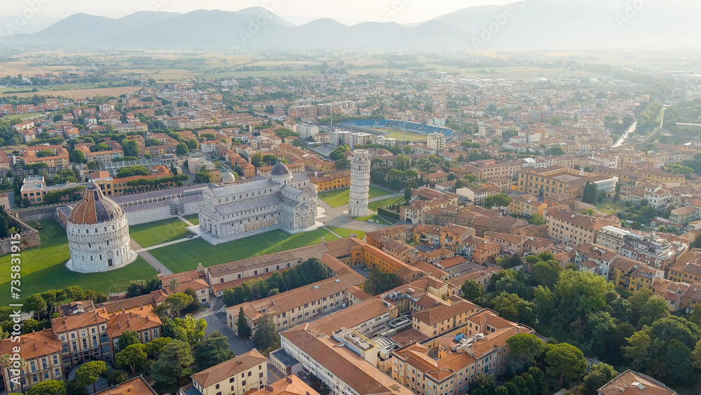 Pisa, Italy. Famous Leaning Tower and Pisa Cathedral in Piazza dei Miracoli. Summer. Morning hours, Aerial View