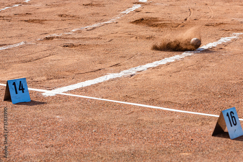 impact of a sphere at shot put photo