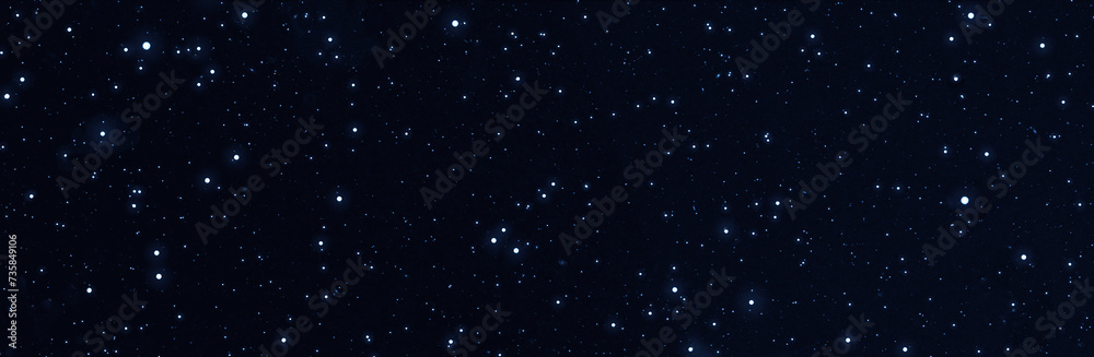 Fototapeta premium Panoramic starry night sky. Galaxy space background. Glowing stars in space. New Year, Christmas and celebration banner background concept.