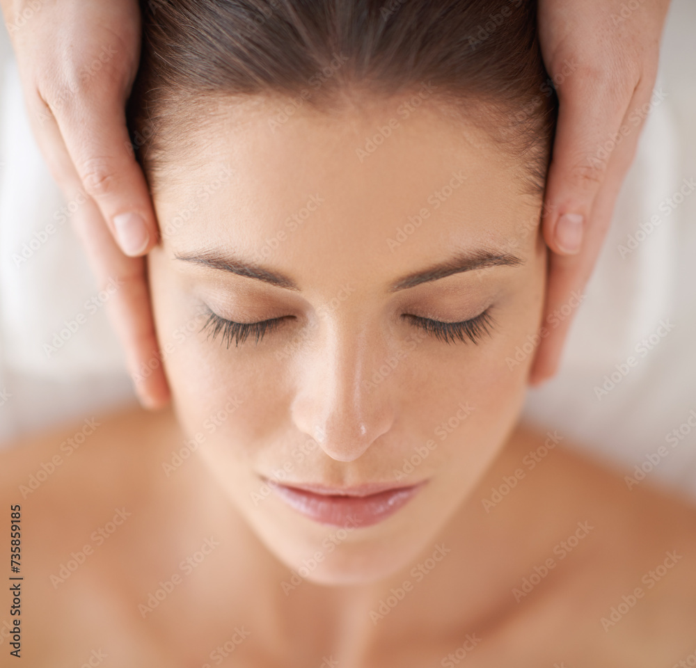Hands, top view and facial massage of woman at spa to relax, peace and closeup at luxury resort with masseuse. Above, therapy and person at salon for face treatment, skincare and beauty for wellness Hands, top view and facial massage of woman at spa to relax, peace and closeup at luxury resort with masseuse. Above, therapy and person at salon for face treatment, skincare and beauty for wellness