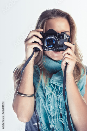 Girl with Camera in her Hands