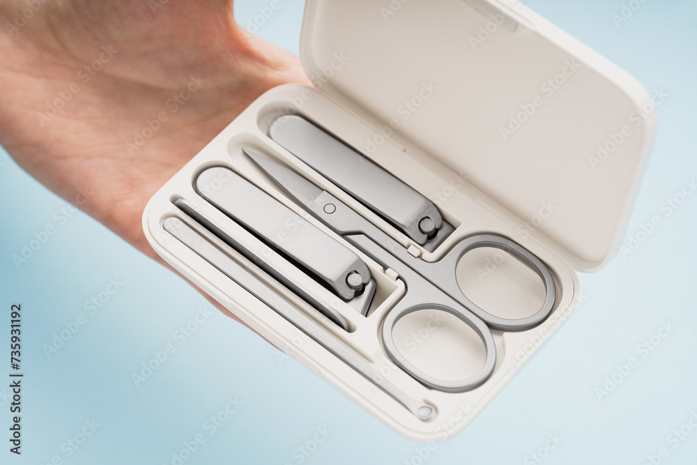 manicure set kit in case, isolated. Manicure accessories. Tools of manicure set isolated on white background. Set of manicure and pedicure tools.	
