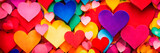 multi-colored hearts on a bright background. Selective focus.