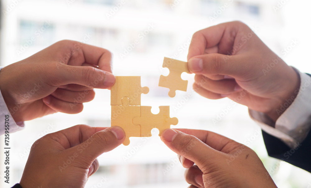 jigsaw puzzle Unity in doing business as a team Business people join the jigsaw team, charity, volunteering, success and strategic thinking. jigsaw puzzle Unity in doing business as a team Business people join the jigsaw team, charity, volunteering, success and strategic thinking.