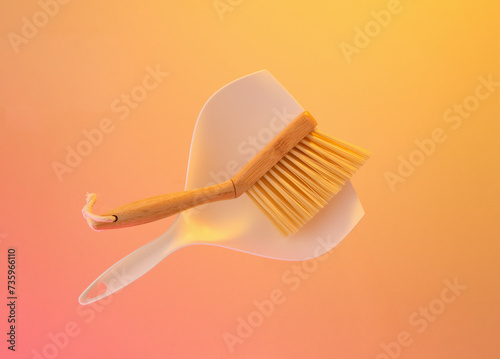 White dustpan and brush, clean and tidy. Natural products for cleaning.