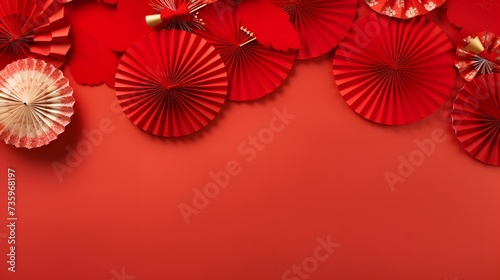 Chinese new year festival or wedding decoration over red background. Traditional lunar new year paper fans. Flat lay  top view  banner