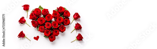 Heart shape made of red roses with love on white background