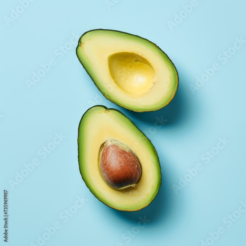 Avocado Half with Pit on Blue